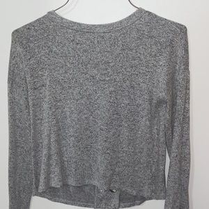 Long sleeved gray shirt